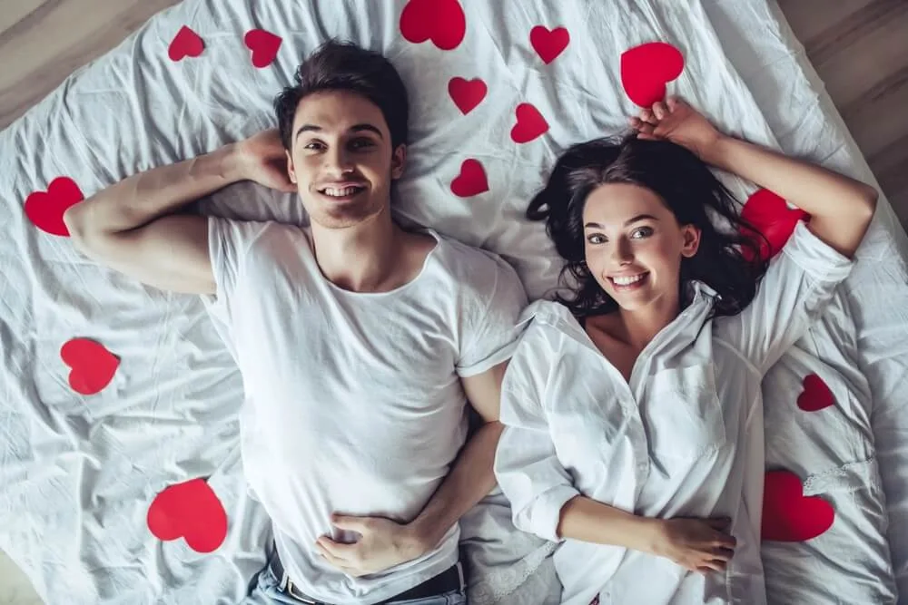 young couple on bed